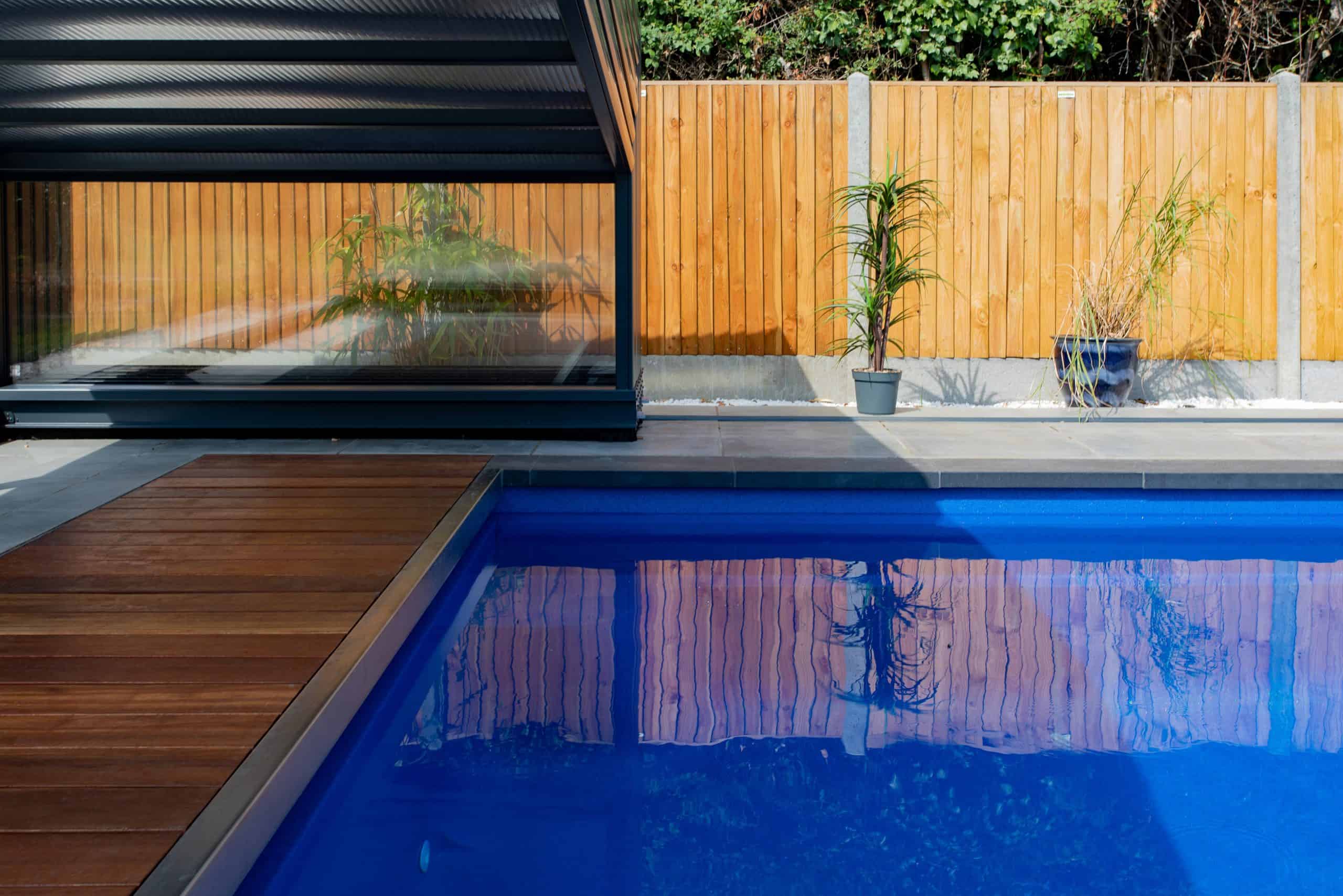 Telescopic pool cover opened Telescopic pool cover opened