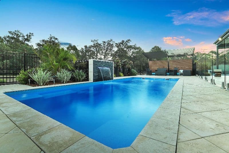 Aqua Technics Regency pool with water feature Aqua Technics Regency pool with water feature
